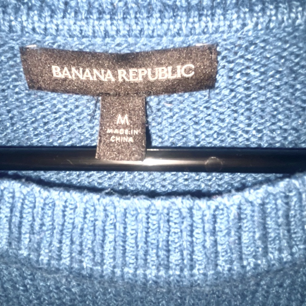 Used sweater,looks looks great,vibrant color, comfortable and catching eye color